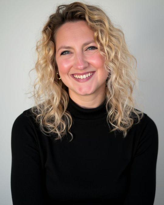 a portrait of a smiling woman