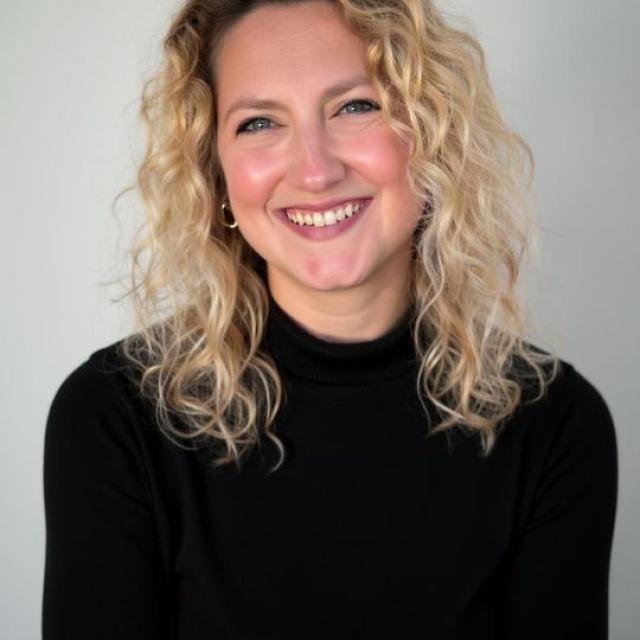 a portrait of a smiling woman